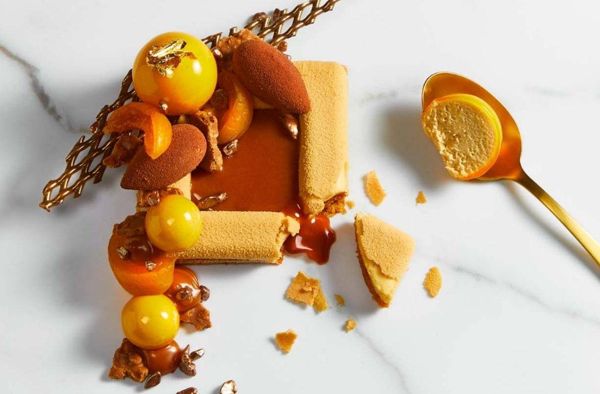 Fall-themed pastry on a white marble background