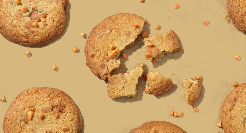 Cookies with inclusions on a tan background