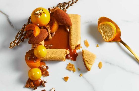 Fall-themed pastry on a white marble background